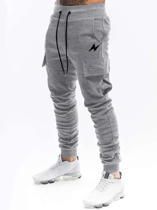 ROMWE Guys Lightning Print Flap Pocket Sweatpants - Premium Men Sweatpants from ZOETOP BUSINESS CO., LIMITED - Just $46.49! Shop now at Nick's Bay Company