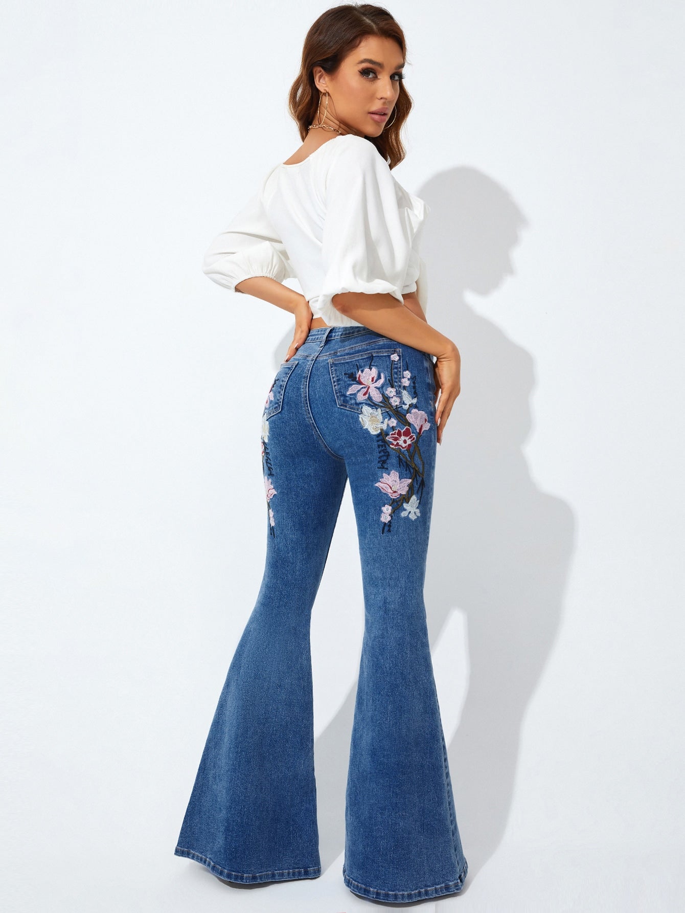 Floral Embroidery Flare Leg Jeans - Premium Women Jeans from ZOETOP BUSINESS CO., LIMITED - Just $67.99! Shop now at Nick's Bay Company