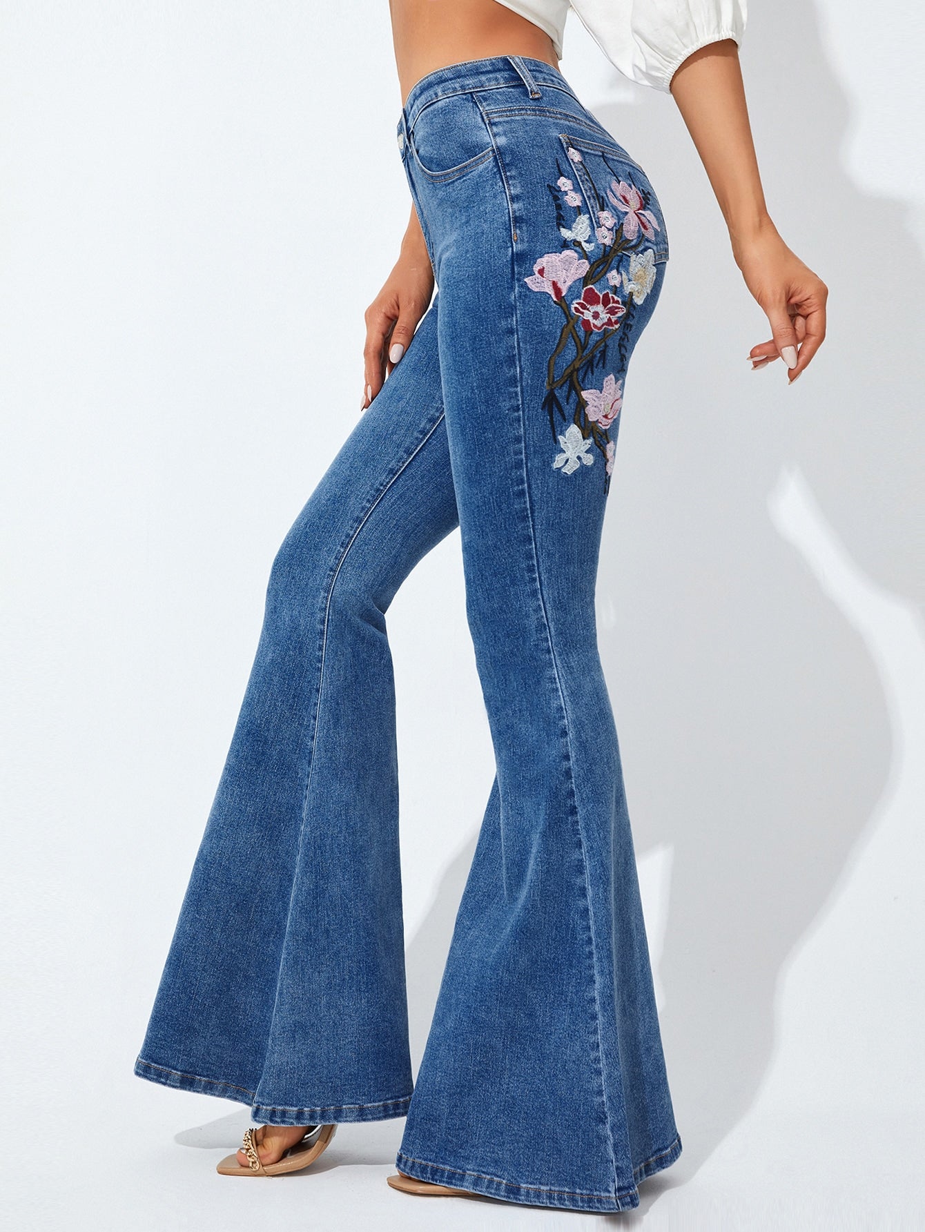Floral Embroidery Flare Leg Jeans - Premium Women Jeans from ZOETOP BUSINESS CO., LIMITED - Just $67.99! Shop now at Nick's Bay Company
